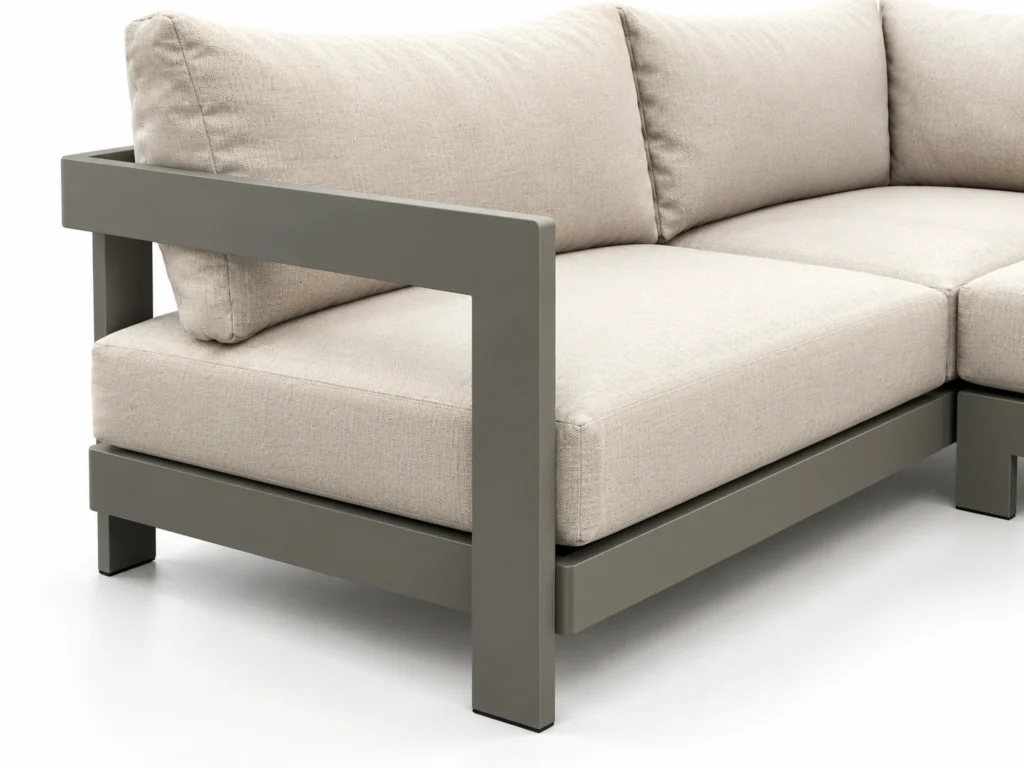 Détail Angolo Pietra : accoudoir ouvert, pied plat et coussin crème